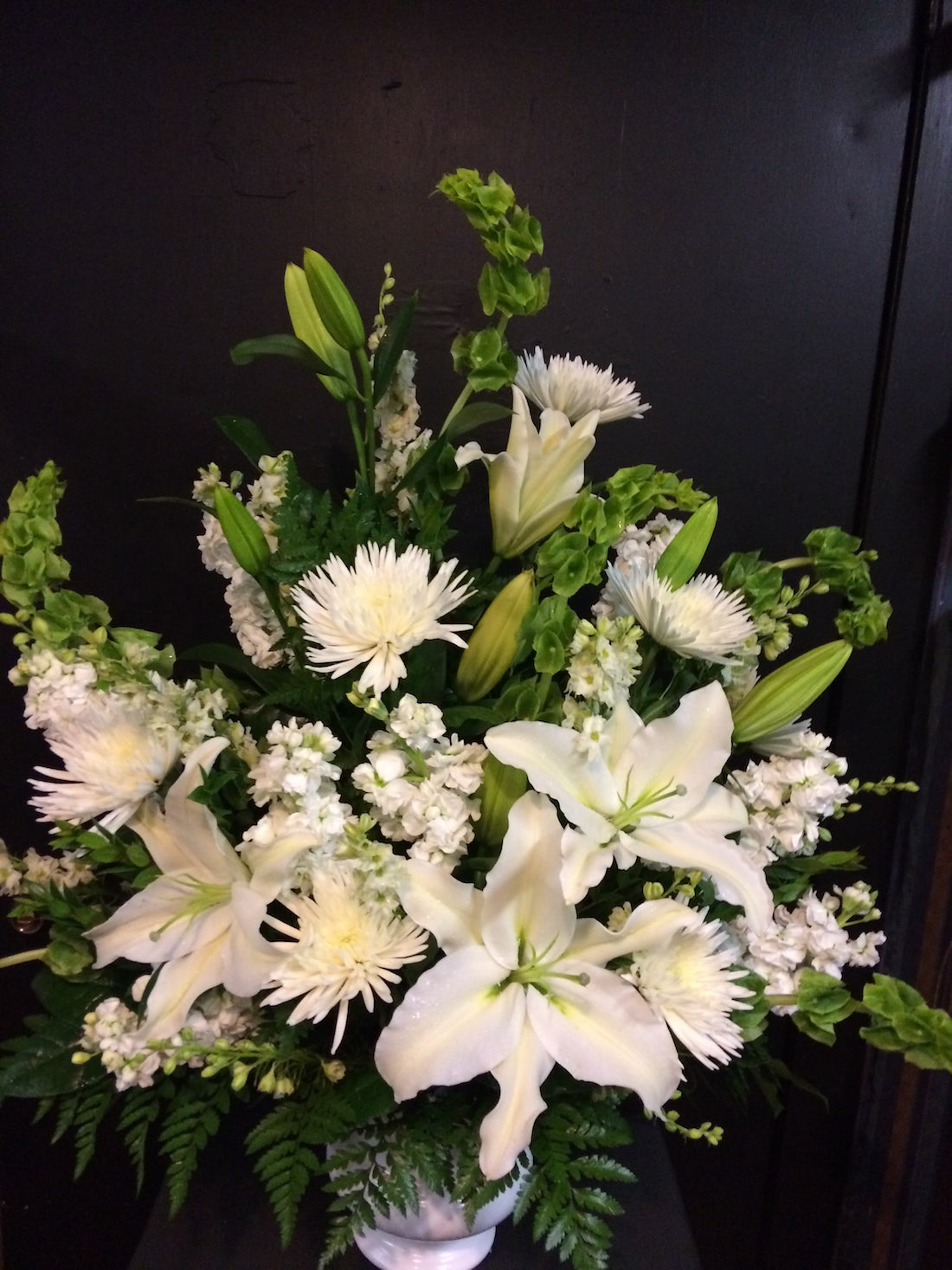 All White Flowers In An Urn