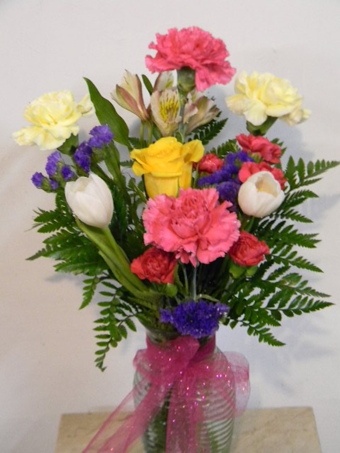 Carnations Tulips Roses Statice Mini Carnations and Alstroemeria